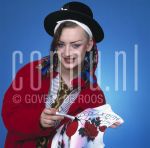 02-04-1983 Boy George at studio in Amsterdam. April 02, 1983.

[keywords]Posed, Half Length, Smiling, Hat[/keywords]